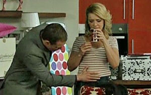 Nick patting Natasha's belly