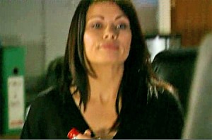 Carla getting bottle from desk for her & Sally