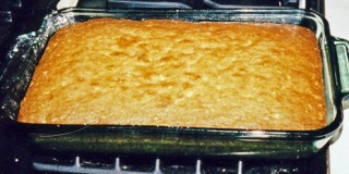 baked cake cooling before icing