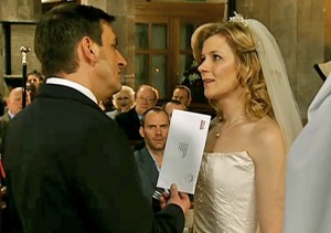 Peter showing Leanne lawyer's letter at altar