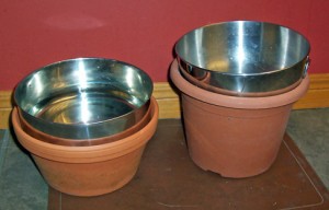 dog bowls raised with two sizes of flower pots photo D Stewart
