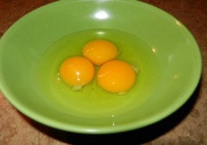 broken eggs in dish photo d stewart