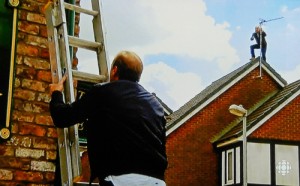 neil-climbs-ladder