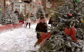 Corrie Christmas with people-coming-out-on-street