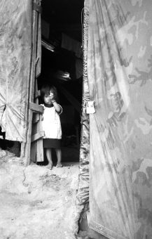child in tent doorway-photo-d-anger-1989