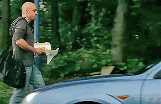 guy with container of chips walks past John's car guy with container of chips walks past John's car