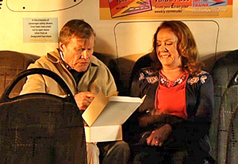 roy-opens-cake-box-cathy